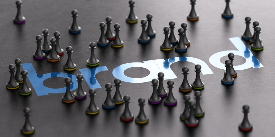 Players standing on a chessboard with the word BRAND, symbolizing strategic brand building and positioning.